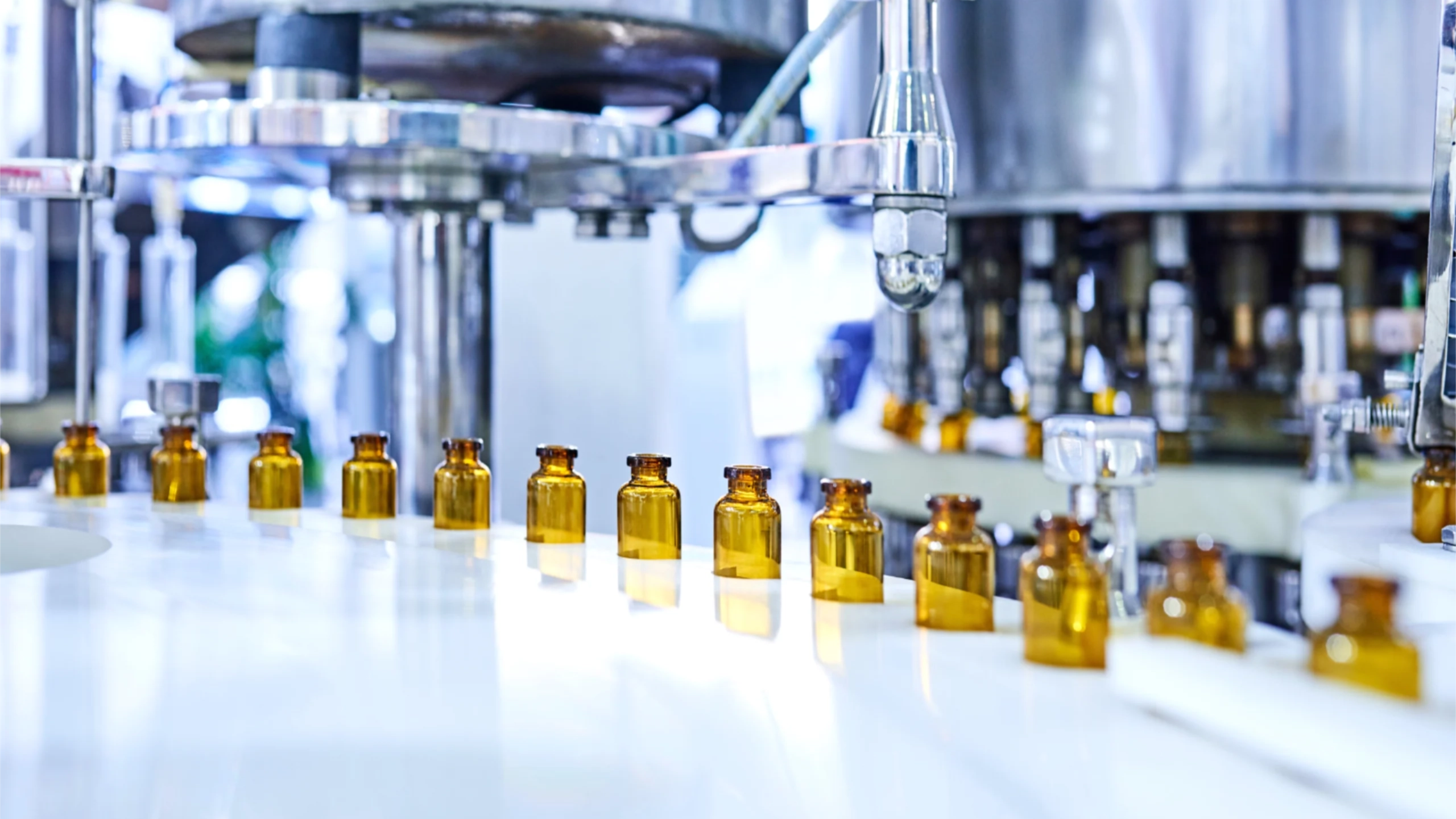 Pharmaceutical pilot plant manufacturing line producing API and clinical trial materials under GMP conditions.